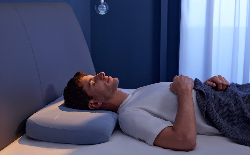 Sleeper resting on a real Nitetronic A1 smart anti-snore pillow