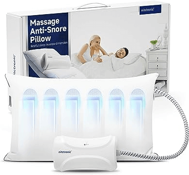 Massage anti-snore pillow with advanced features shown in bedroom setting for effective snoring reduction.