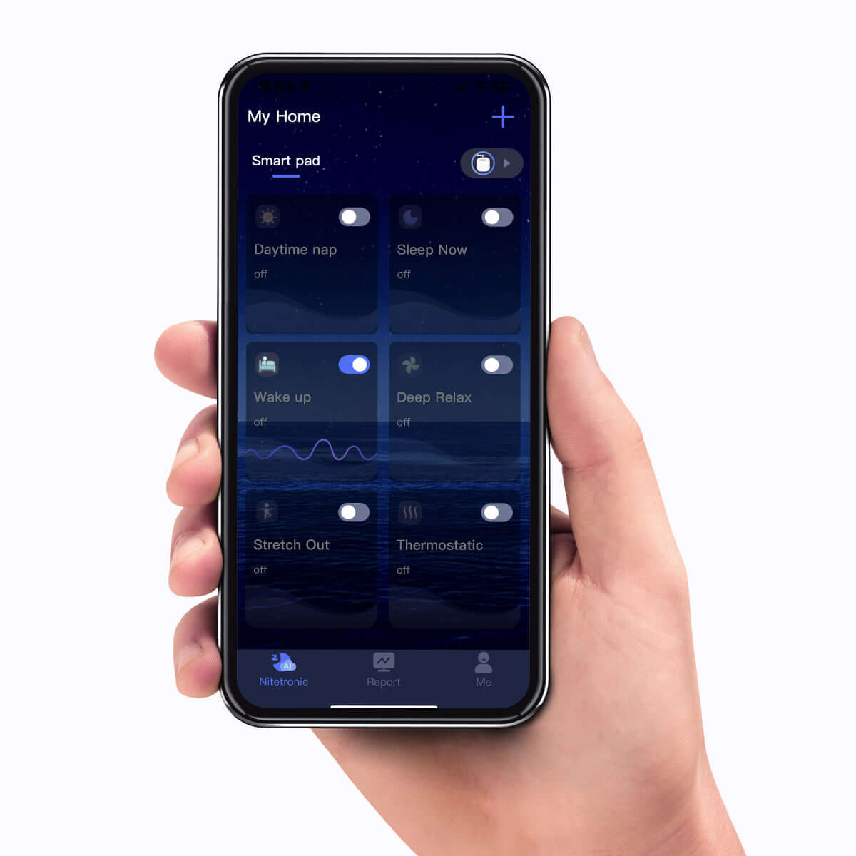 Hand holding smartphone showing smart home app interface with sleep and relaxation settings on screen.