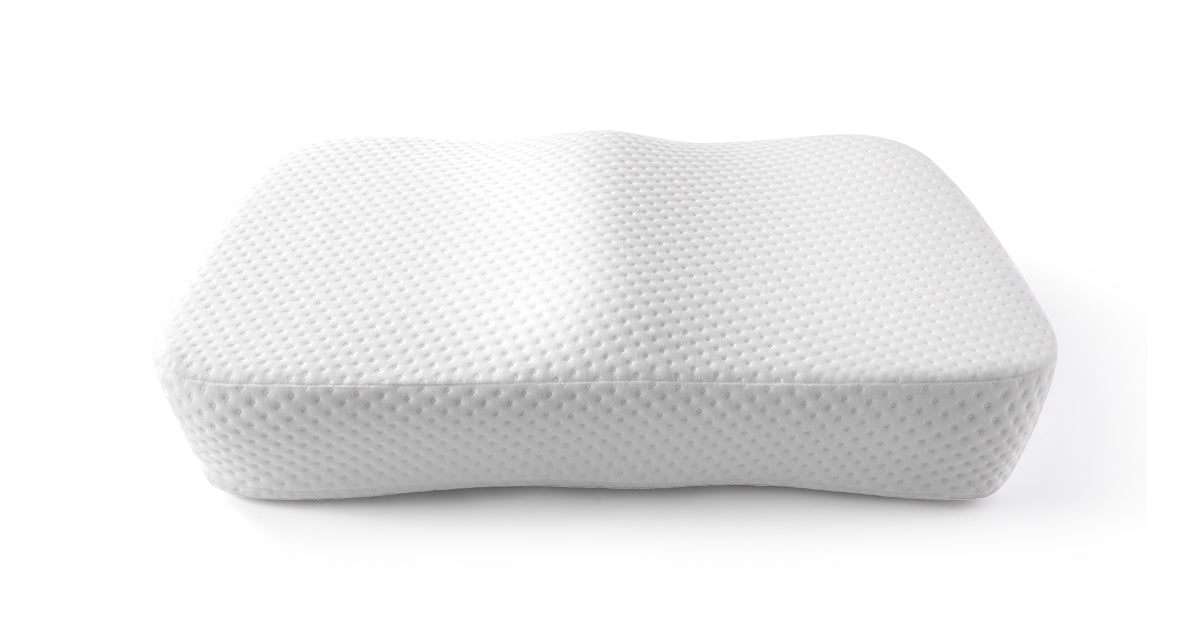 Ergonomic white memory foam pillow with textured cover for neck support.
