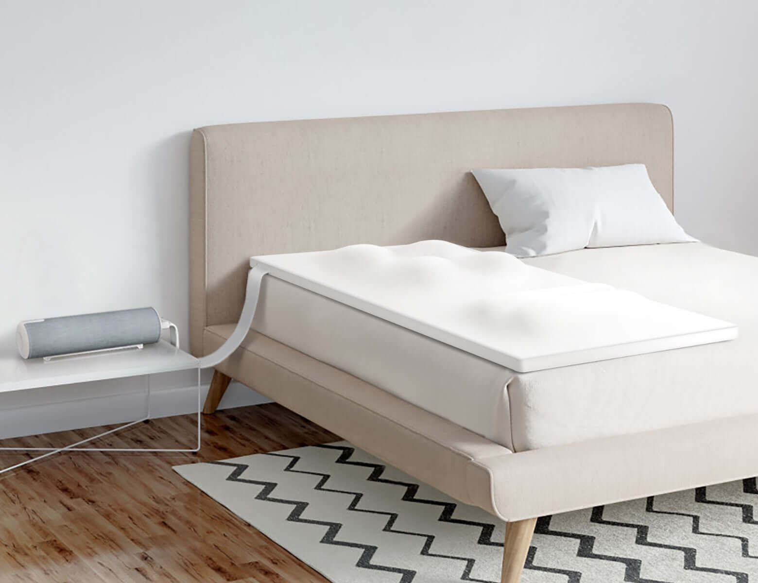 Mattress with integrated wave-like air pump system for comfort enhancement on a modern bed.