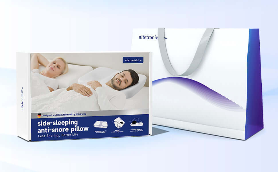 Side-sleeping anti-snore pillow packaging with retail shopping bag, promoting better sleep and less snoring solutions.