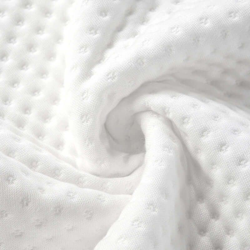 Close-up of breathable, high-elastic spandex cover for Nitetronic Z10 anti-snore pillow; ergonomic and eco-friendly design.