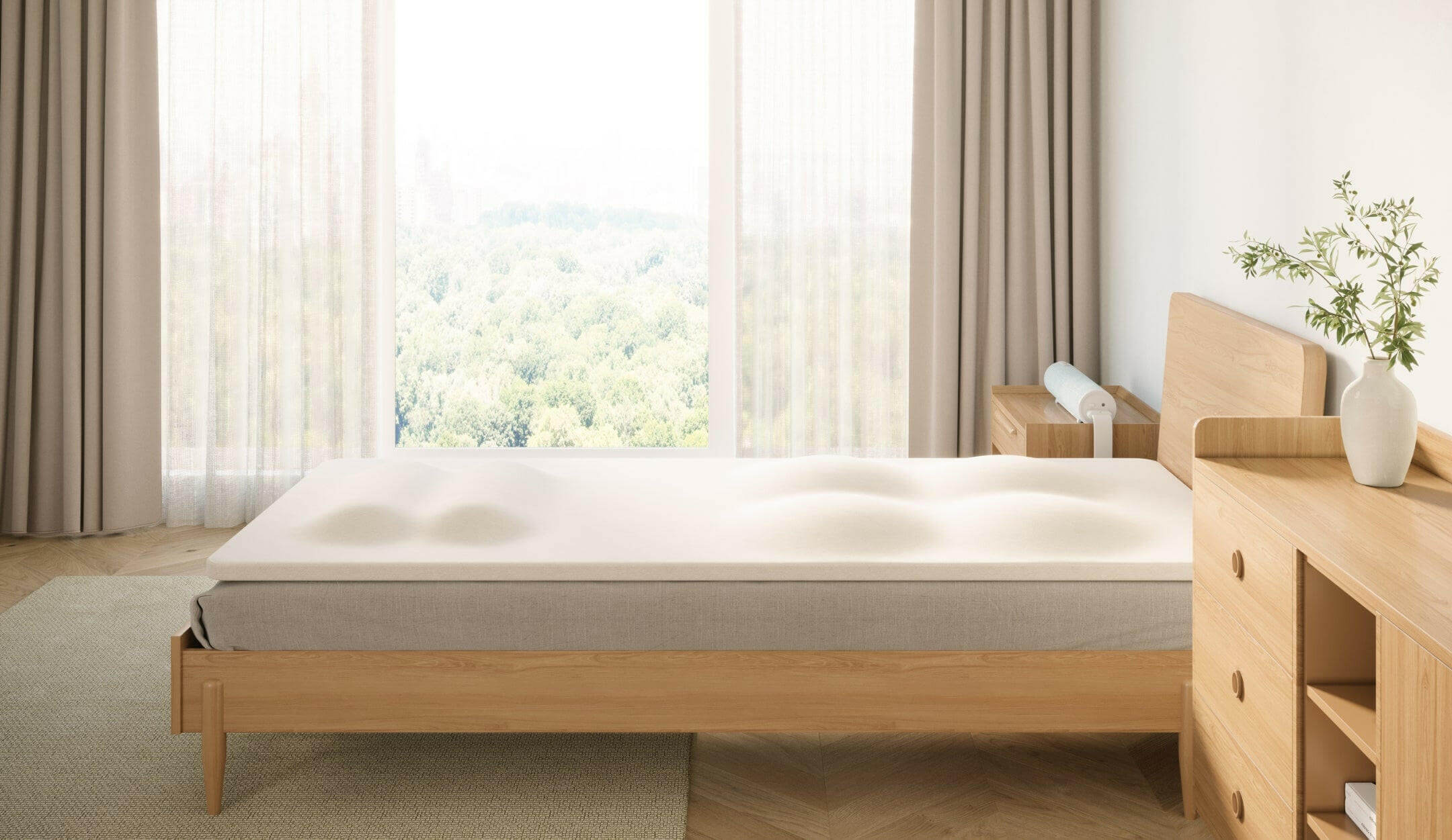 Nitetronic T3 Pro Smart Mattress Pad on bed, features air chambers for body relaxation and improved sleep quality.