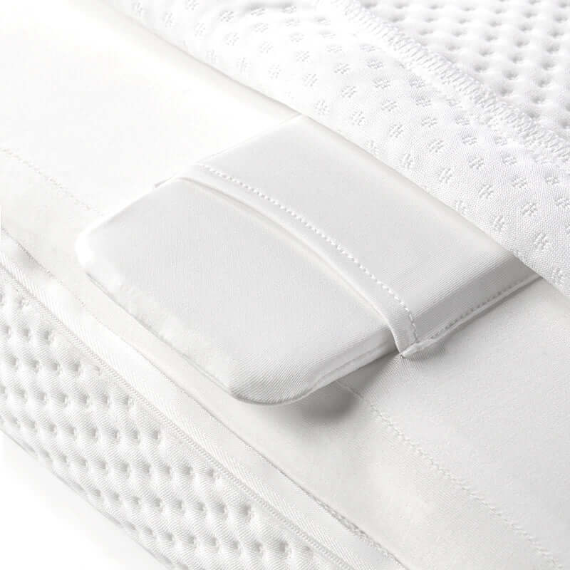 Nitetronic Z10 anti-snore pillow with adjustable height, breathable spandex cover, and ergonomic design for side sleepers.