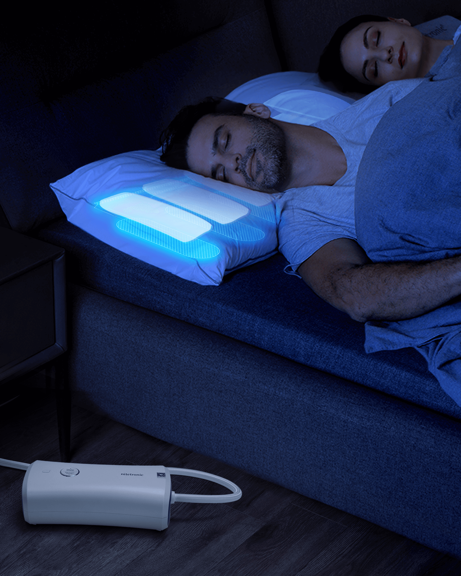 Couple sleeping with Nitetronic Z6 Smart Anti-Snore Pillow, showing sensor technology for snoring reduction and adjustable height.