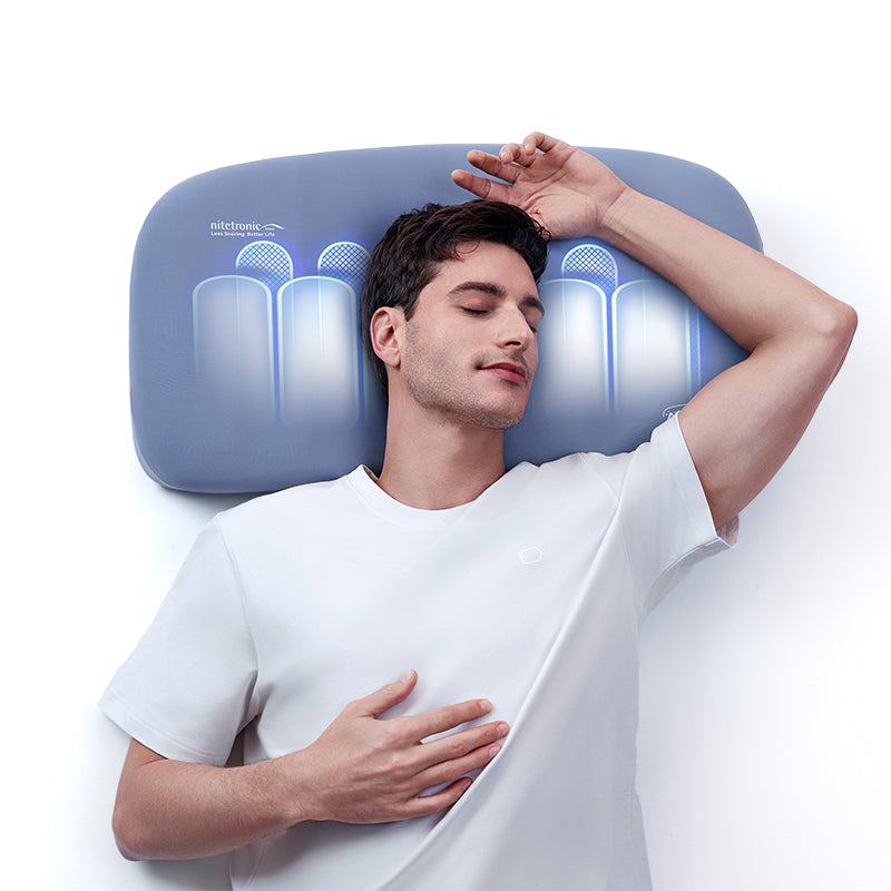 Man sleeping on Nitetronic A1 AI Anti-Snore Pillow with advanced AI for snore reduction and sleep posture improvement.