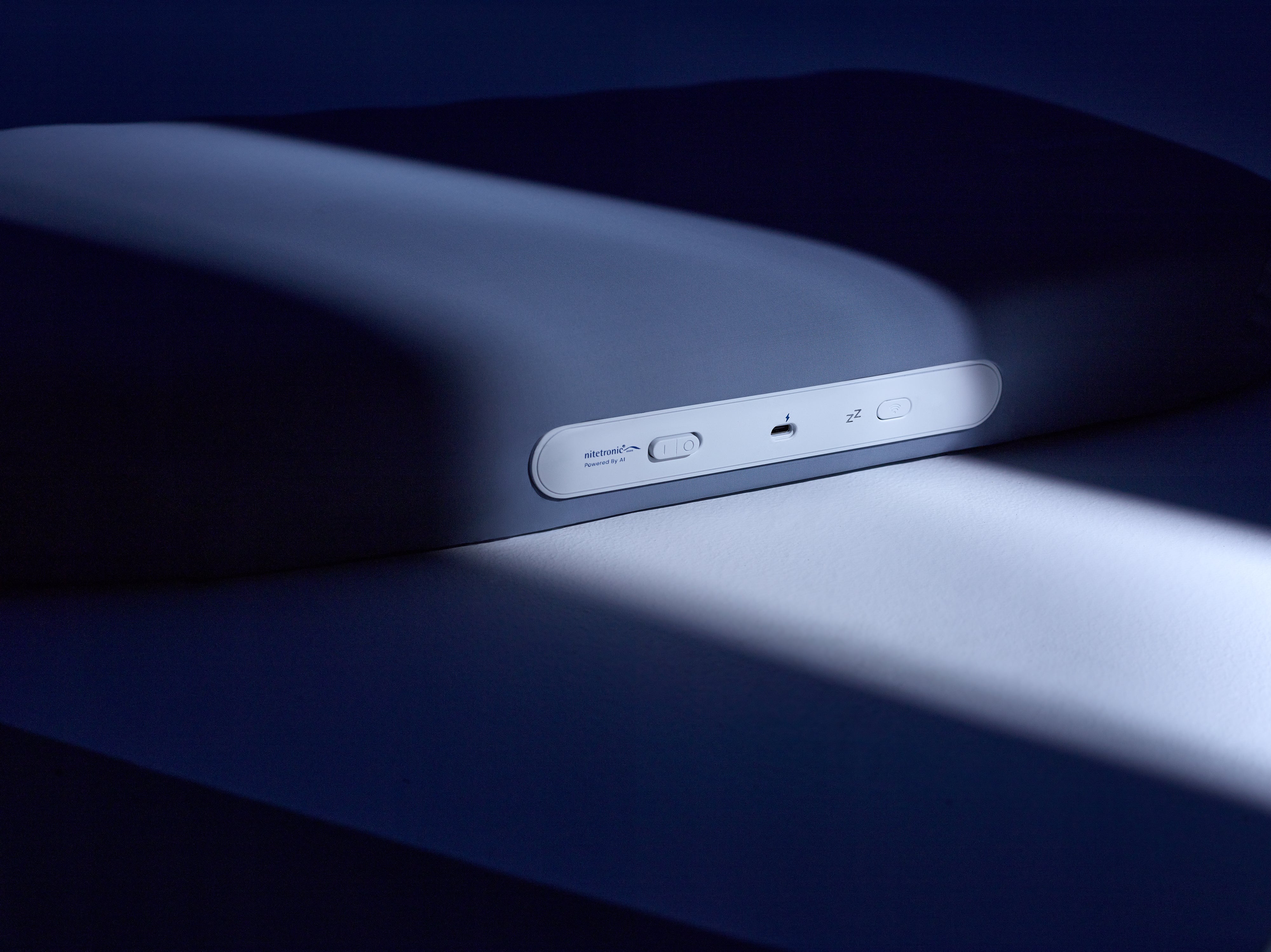 Nitetronic A1 AI Anti-Snore Pillow with app connectivity and ergonomic design.